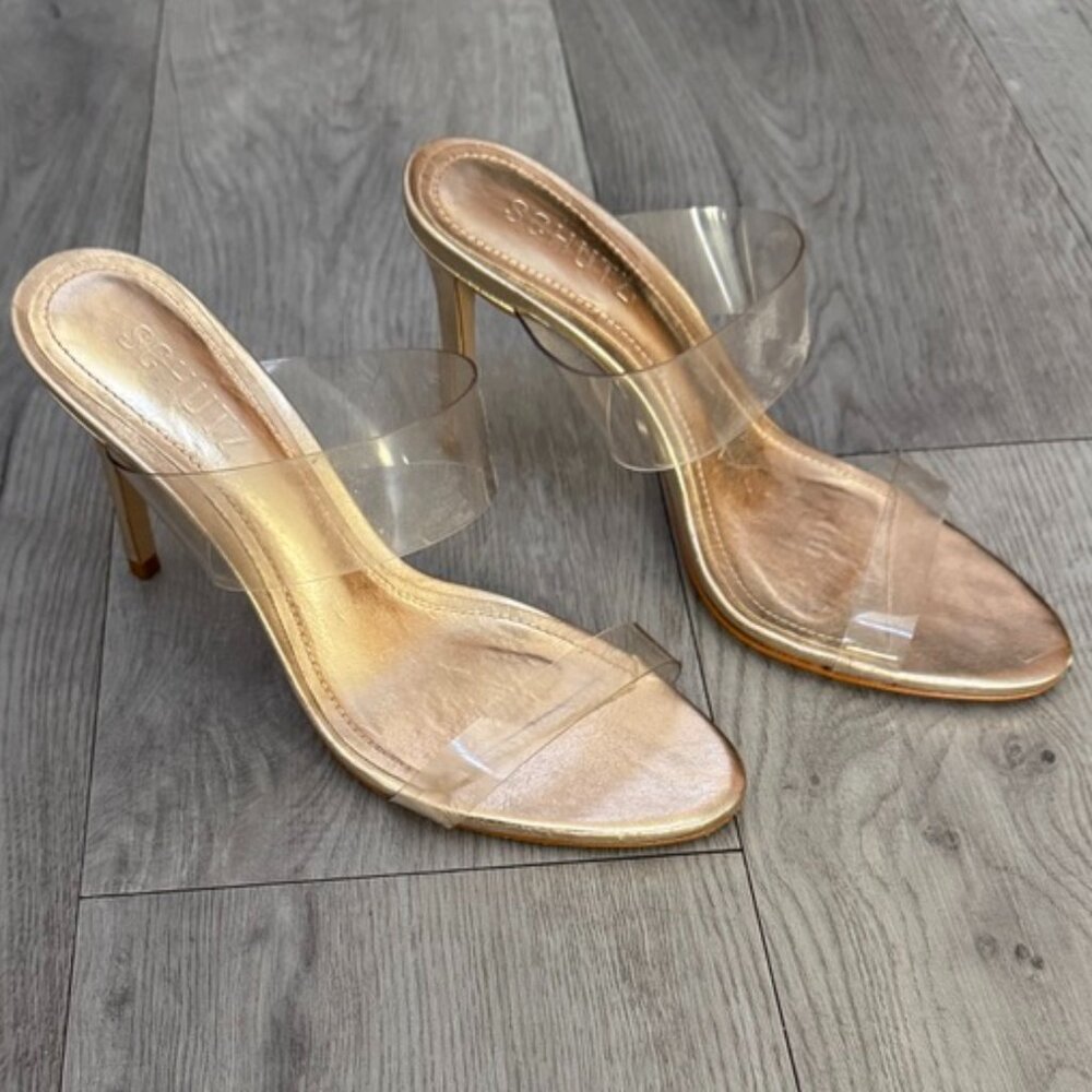 Clear and gold heels